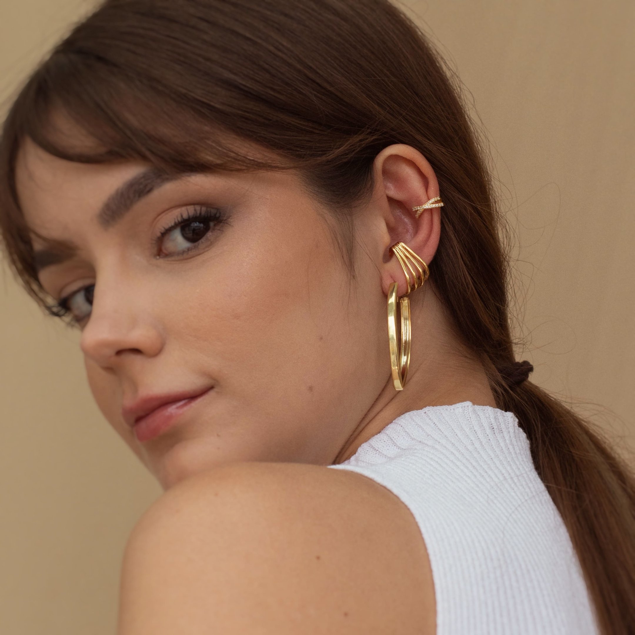 PIERCING X ZIRCÔNIAS DOURADA FOLHEADO