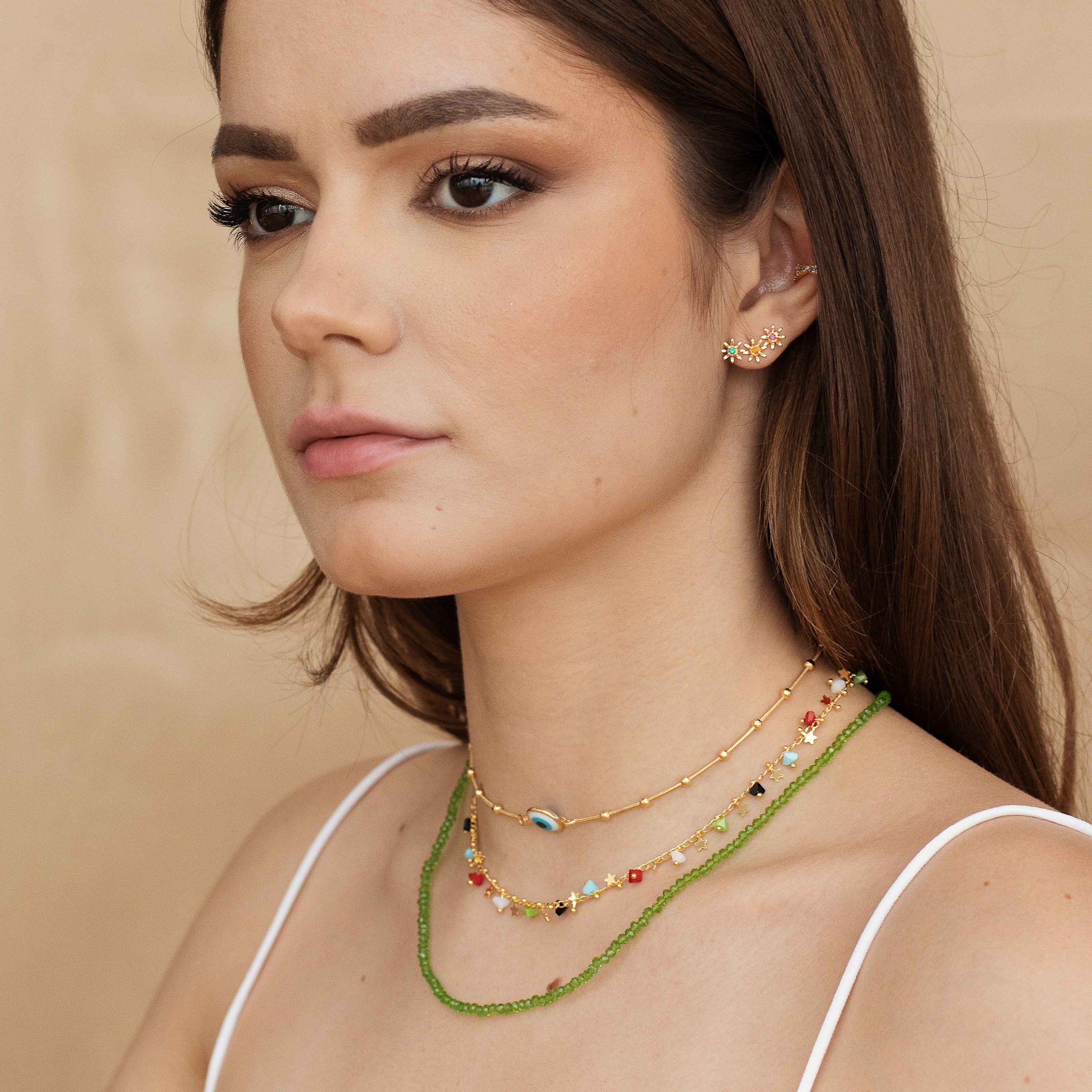 CHOKER PEDRINHAS COLORS E ESTRELINHAS PENDURADAS DOURADO FOLHEADO
