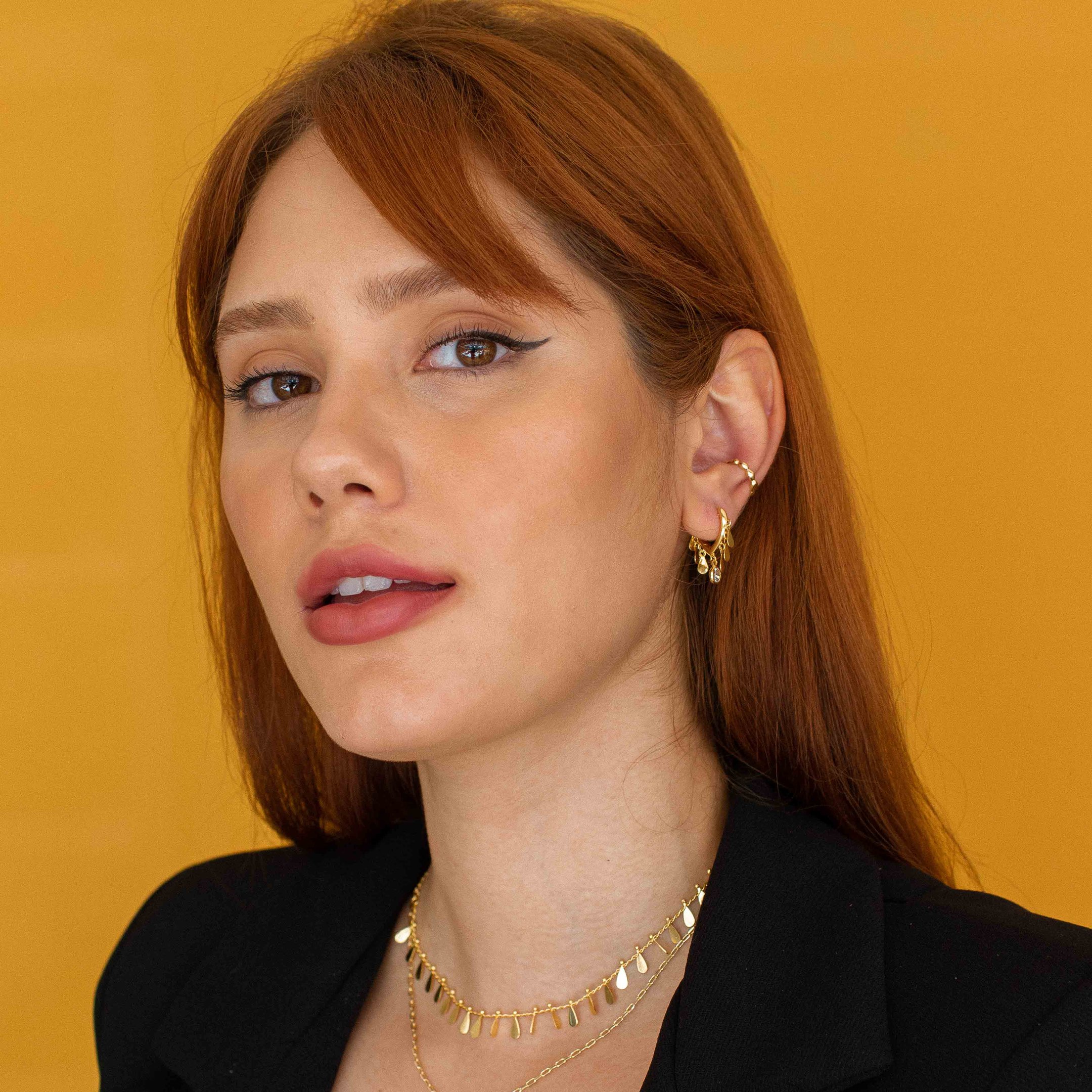 PIERCING ONDA CHEIA DOURADO FOLHEADO