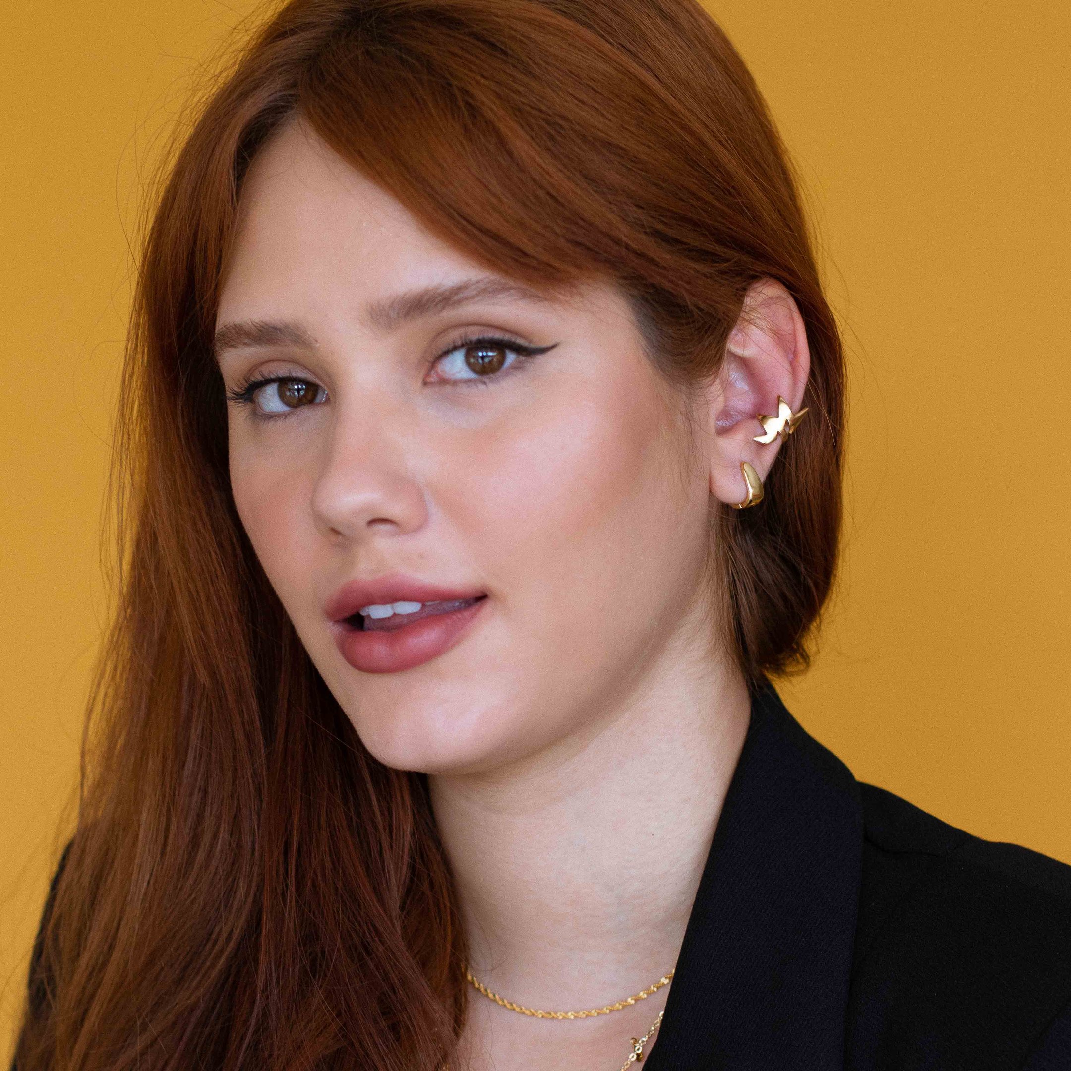 PIERCING RAIO DE SOL DOURADO FOLHEADO