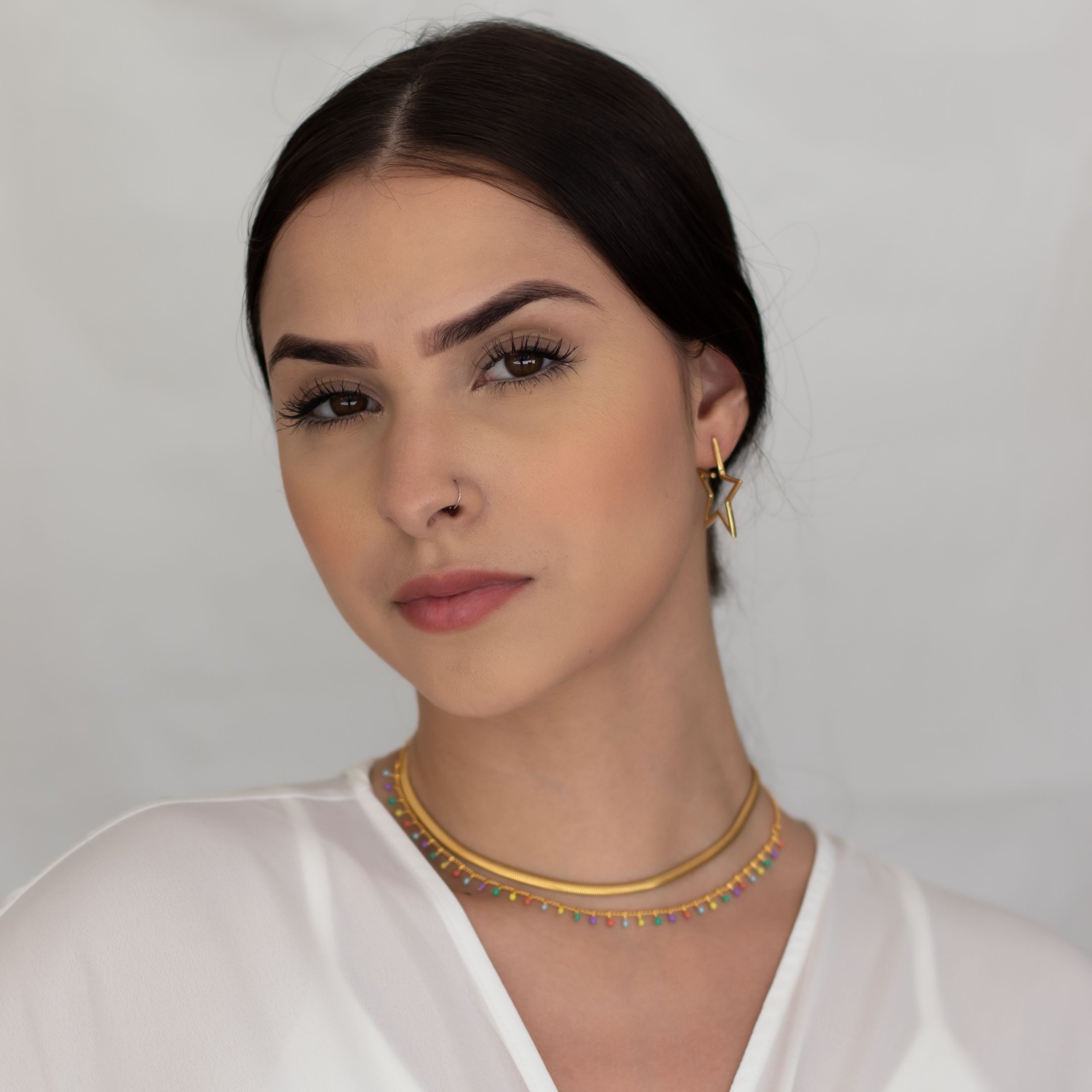 ARGOLA ESTRELA LISA G DOURADO FOLHEADO