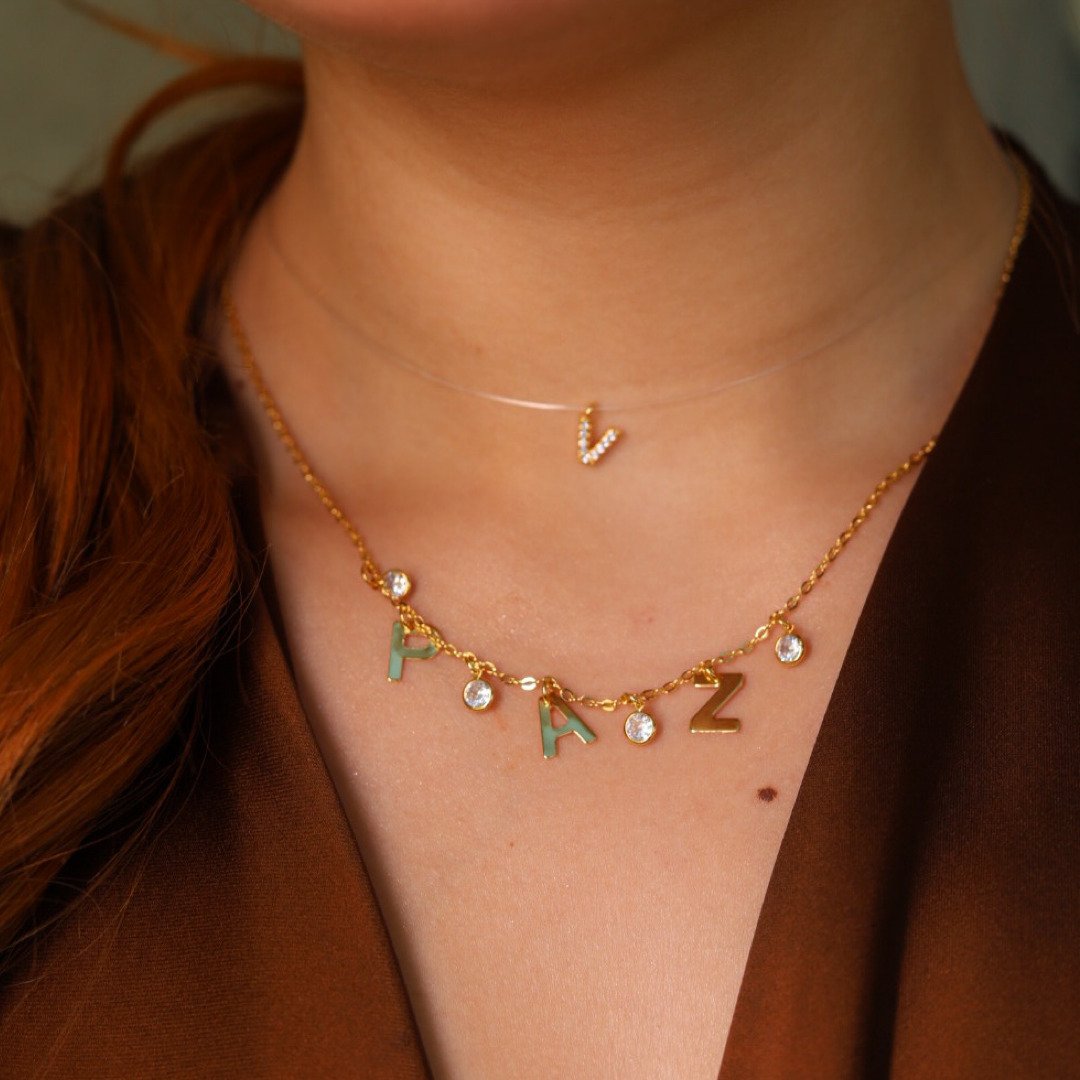 COLAR PAZ COM PONTOS DE LUZ DOURADO FOLHEADO