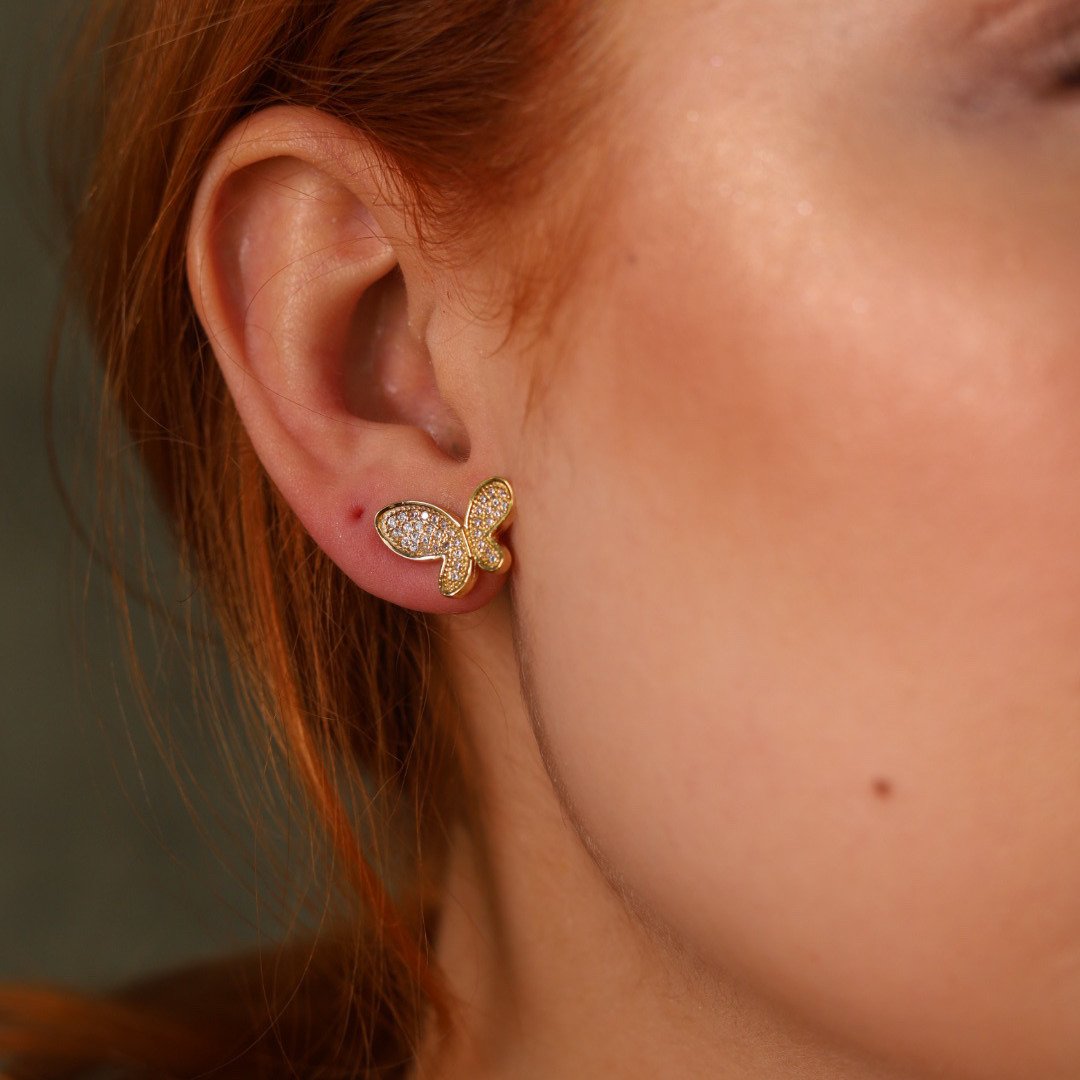 EAR LINE BORBOLETA ASA ABERTA ZIRCONIA COM BORBOLETA DOIS FUROS DOURADO FOLHEADO