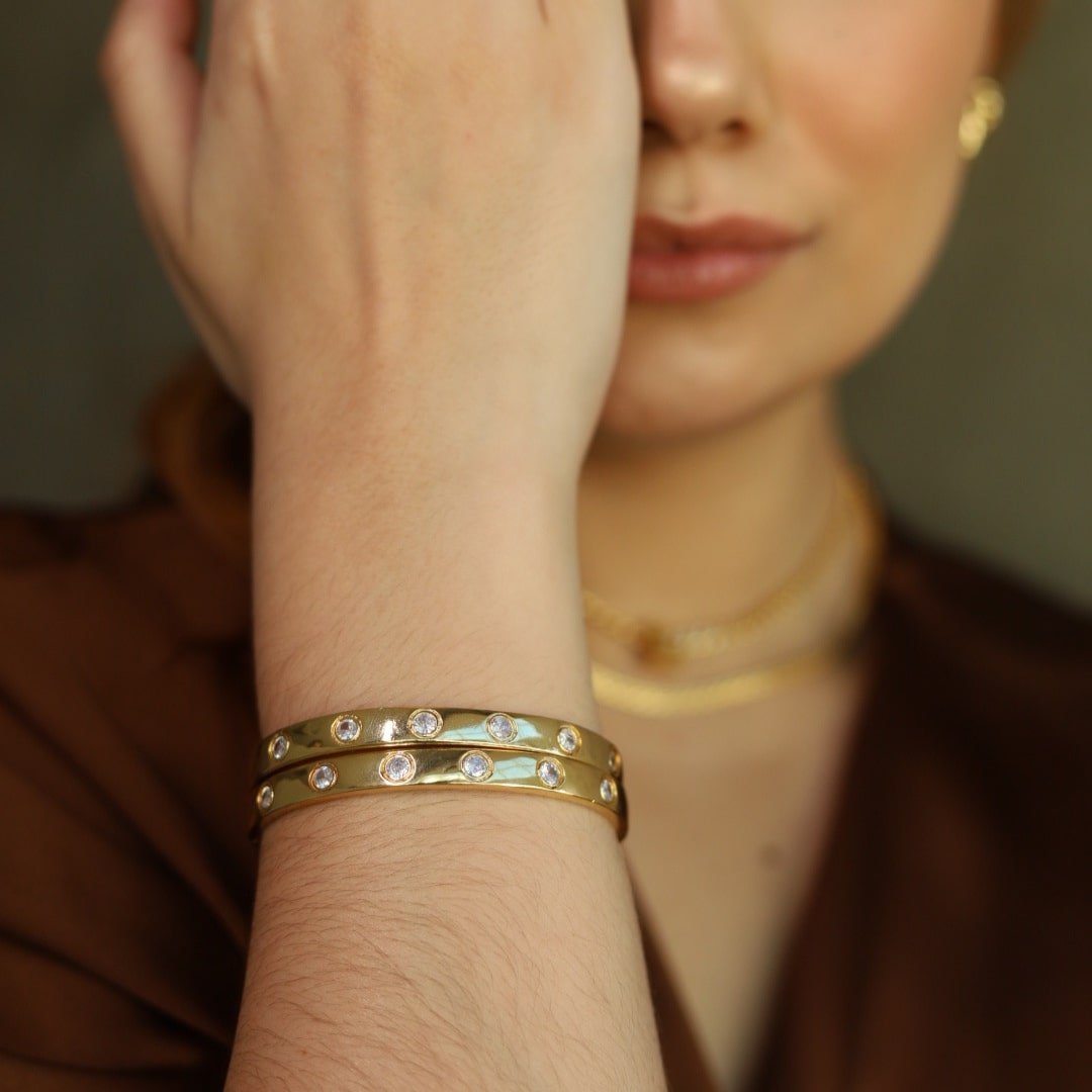 BRACELETE ART ZIRCÔNIAS DOURADO FOLHEADO