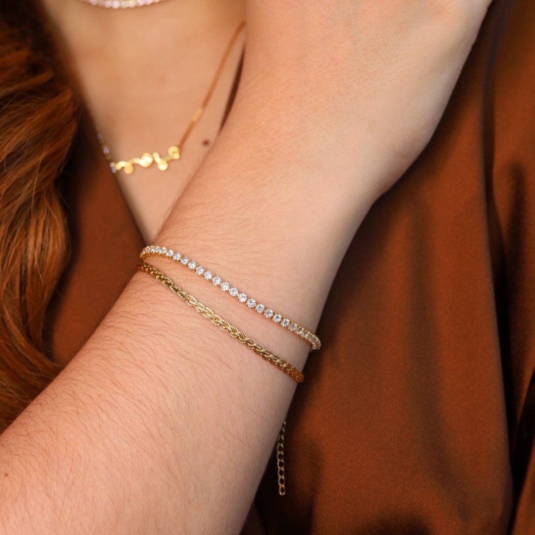 PULSEIRA TRANÇA COM BORDA DOURADO FOLHEADO