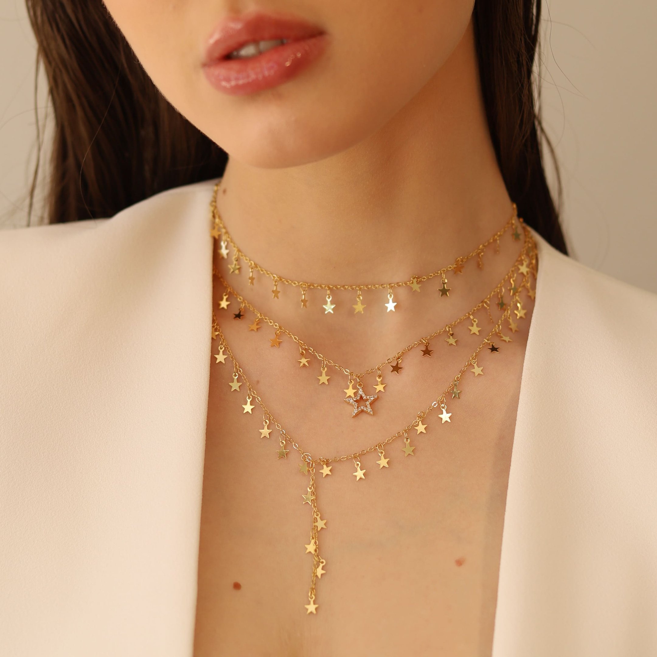 COLAR ESTELAS COM PINGENTE ESTRELA ZIRCÔNIAS DOURADO FOLHEADO