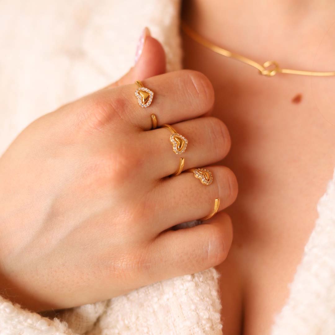 ANEL CORAÇÃO COM BORDA DE ZIRCÔNIA AJUSTAVEL DOURADO FOLHEADO
