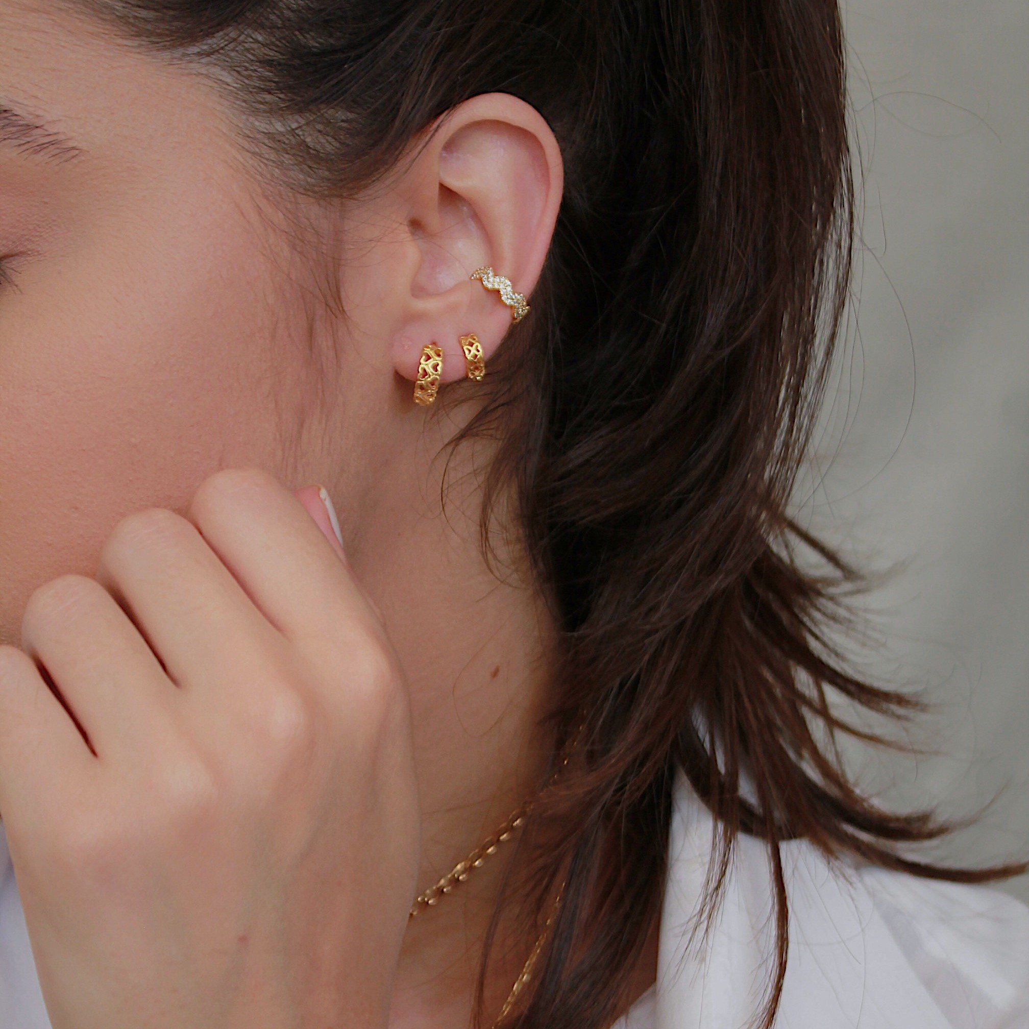 PIERCING ONDULADO ZIRCÔNIA DUPLA DOURADO FOLHEADO