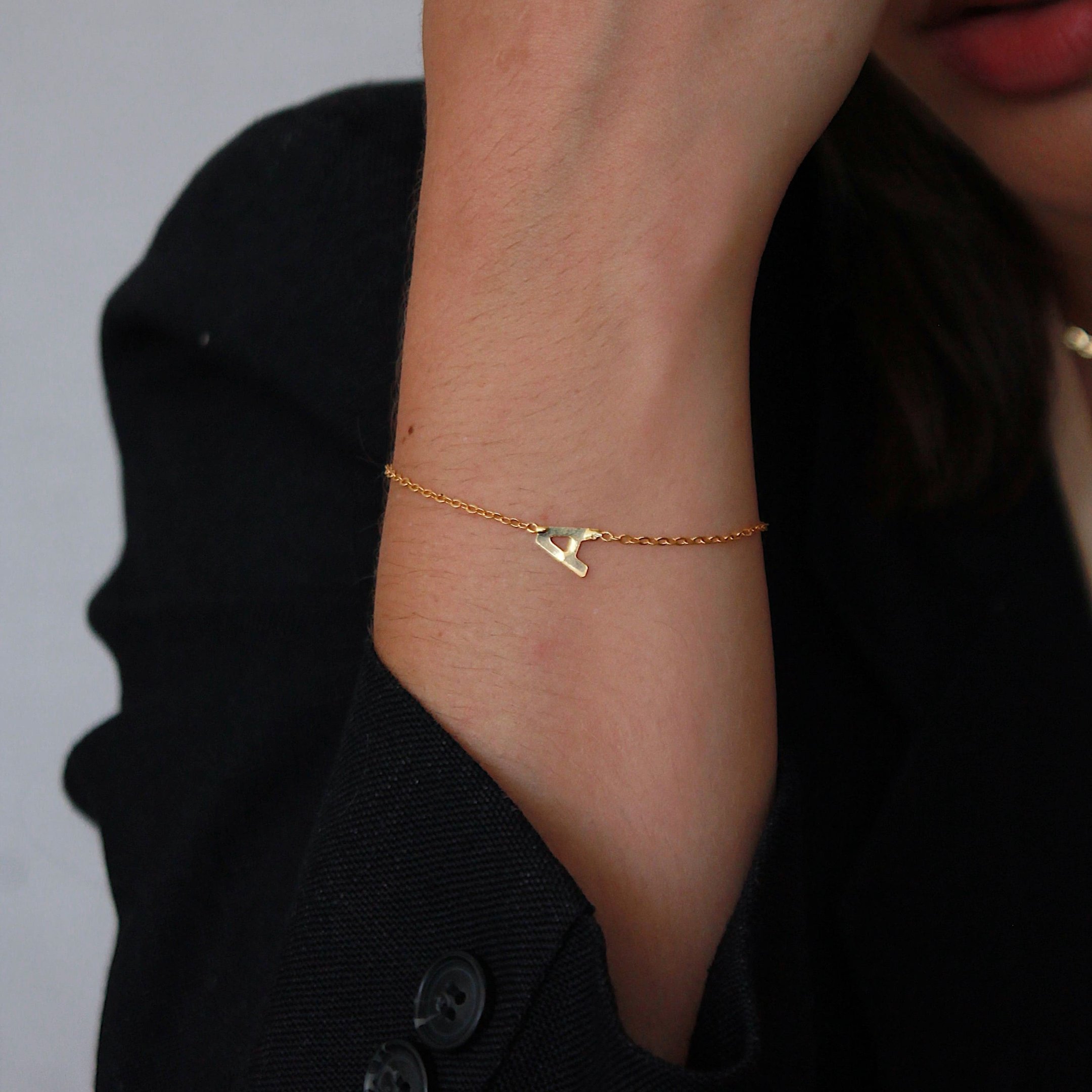 PULSEIRA LETRA DOURADO FOLHEADO
