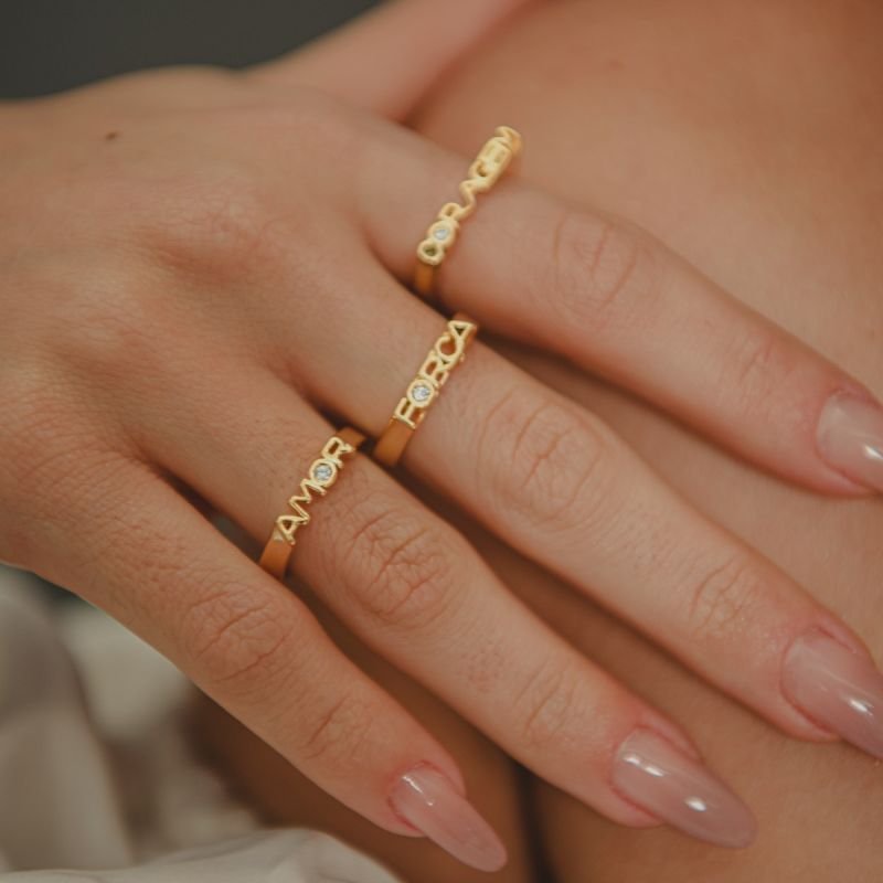 ANEL AMOR PONTO DE LUZ DOURADO FOLHEADO