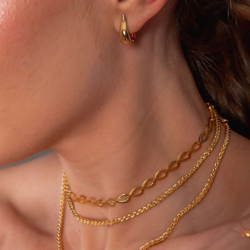 ARGOLA ESTILO GOTA LISA P DOURADO FOLHEADO