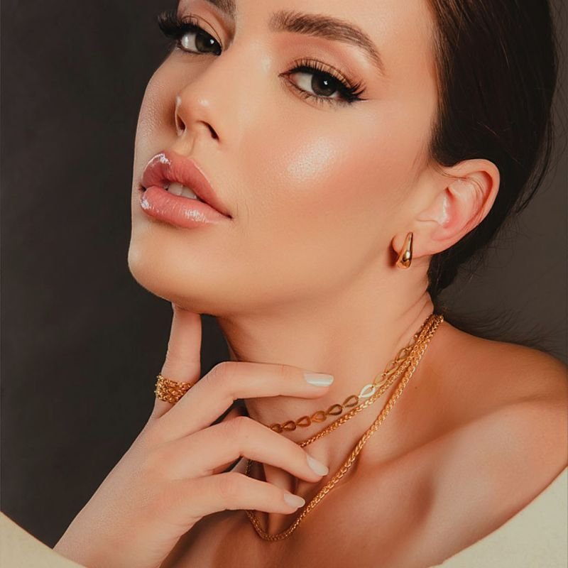 ARGOLA ESTILO GOTA LISA P DOURADO FOLHEADO