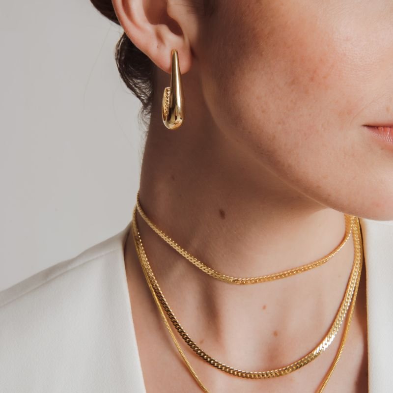 ARGOLA GOTA ALONGADA G BANHADO A OURO 18K