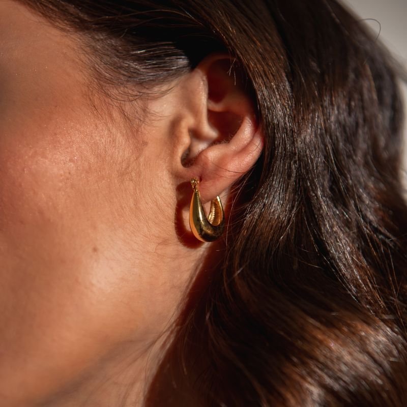 ARGOLA U ABAULADA P DOURADO FOLHEADO