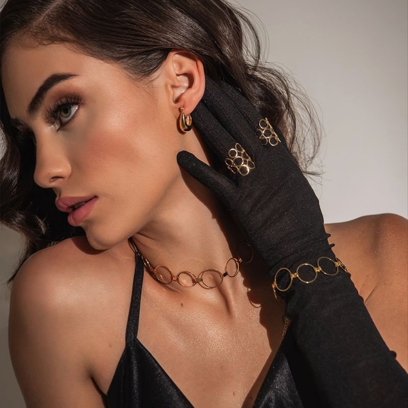 ARGOLA U ABAULADA P DOURADO FOLHEADO