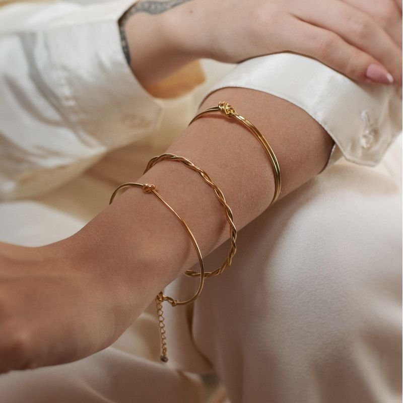 BRACELETE NÓ COM DOURADO FOLHEADO