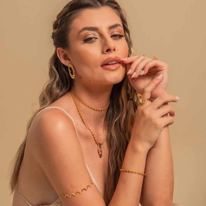 BRACELETE ANTEBRAÇO ONDAS BANHADO A OURO 18K