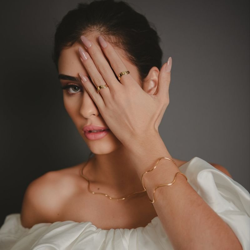 BRACELETE ONDULADO DOURADO FOLHEADO