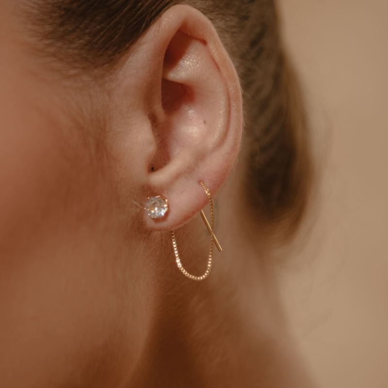 BRINCO ALFINETE PONTO DE LUZ DOURADO FOLHEADO