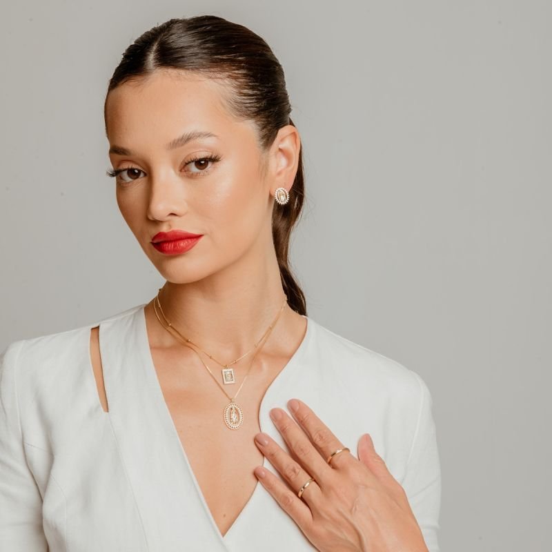 BRINCO ÁUREA SANTA DOURADO FOLHEADO