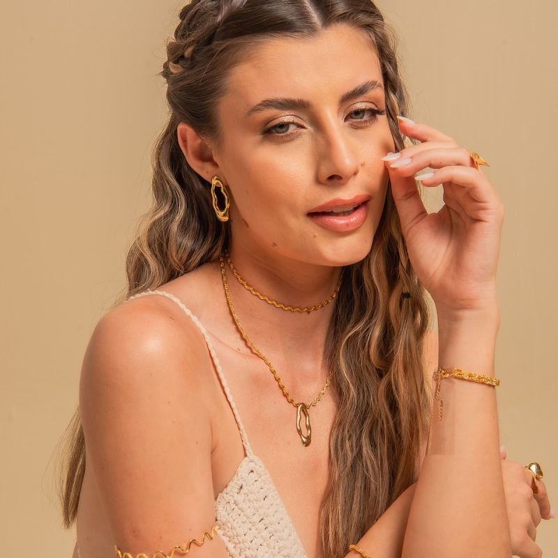 BRINCO ORGANICA LYRA DOURADO FOLHEADO