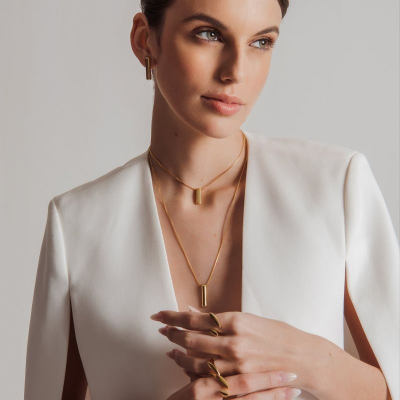 BRINCO PALITO ARREDONDADO M BANHADO A OURO 18K