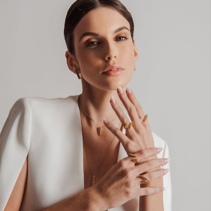 BRINCO PALITO ARREDONDADO M BANHADO A OURO 18K