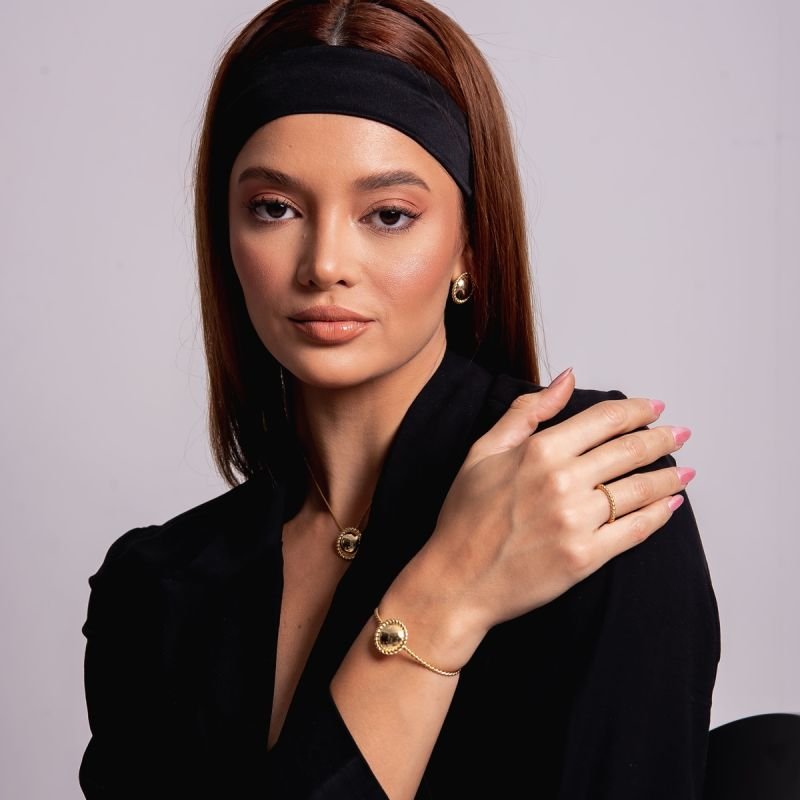 BRINCO CIRCULO TRANÇADO BANHADO A OURO 18K