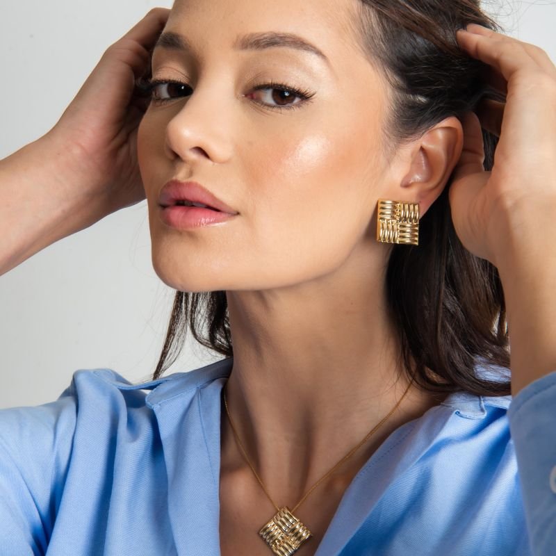 BRINCO SQUADRA BANHADO A OURO 18K