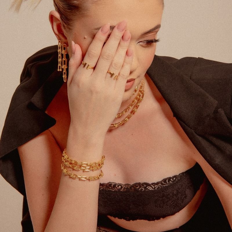 BRINCO TIFFA ELOS P BANHADO A OURO 18K