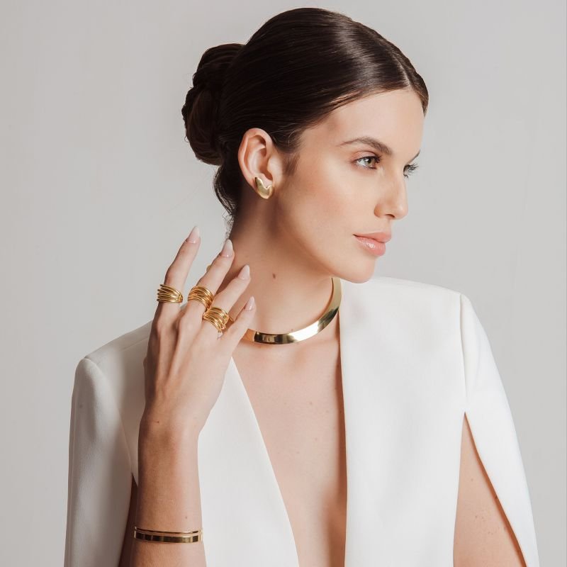 BRINCO VIRGULA BANHADO A OURO 18K