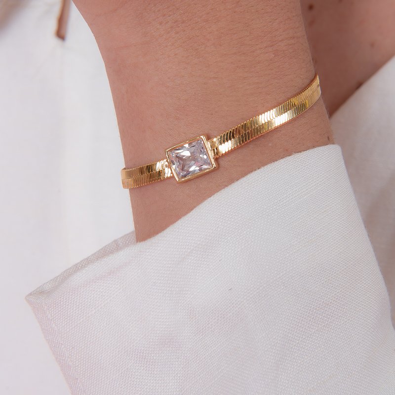 PULSEIRA SNAKE PEDRA RETANGULAR CRISTAL DOURADO FOLHEADO