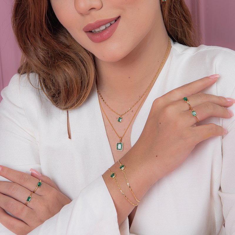 PULSEIRA PEDRA RETANGULAR MINI ESMERALDA DOURADO FOLHEADO