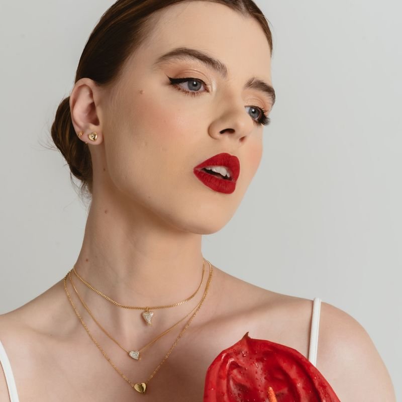 KIT DOIS PARES DE BRINCO CORAÇÃO COM ZIRCÔNIA NO MEIO DOURADO FOLHEADO