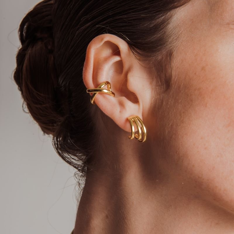 PIERCING X LISO M DOURADO FOLHEADO