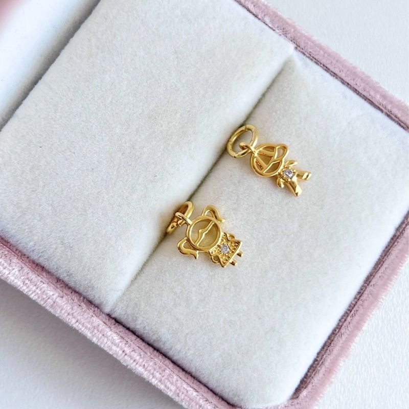 PINGENTE FILHOS CRAVEJADOS DE ZIRCÔNIA DOURADO FOLHEADO