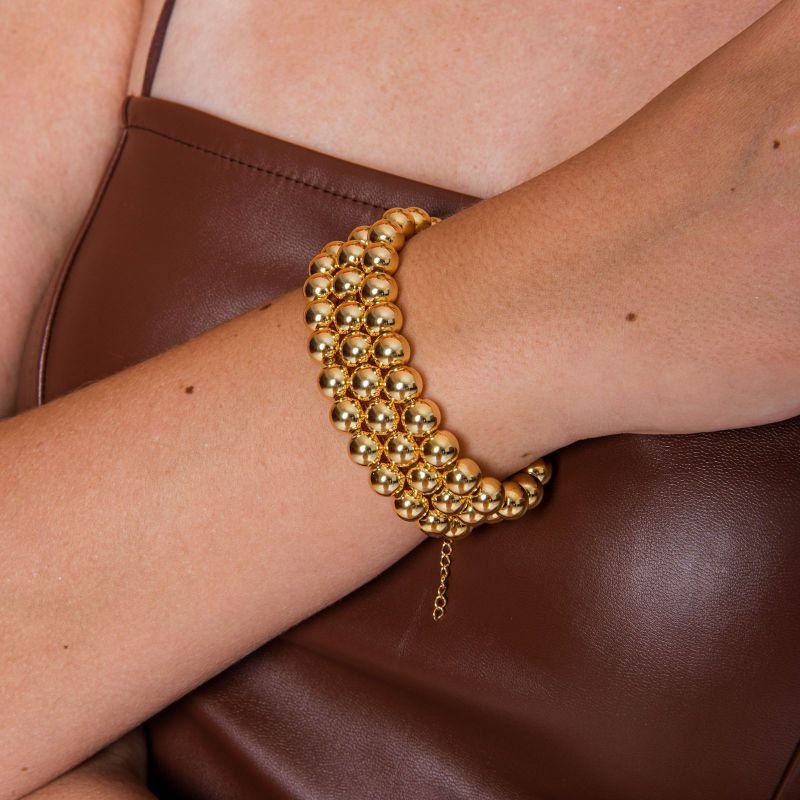 PULSEIRA BOLINHAS 8MM ABS BANHADO A OURO 18K