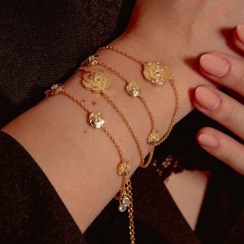 PULSEIRA CAMELÍA COM ZIRCÔNIA GRAVATA BANHADO A OURO 18K