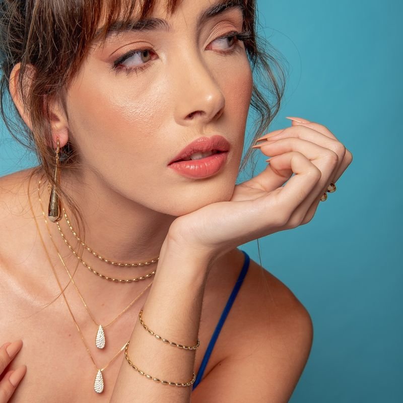 PULSEIRA CAPSULA LISA DOURADO FOLHEADO