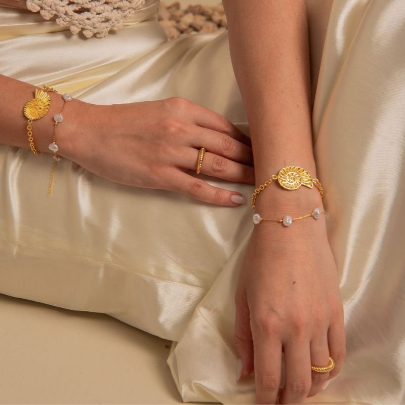 PULSEIRA CARACOL BANHADO A OURO 18K