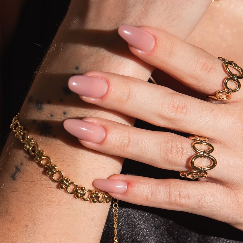 PULSEIRA CIRCULOS LIGADOS POR BOLINHAS DOURADO FOLHEADO