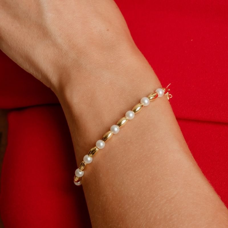 PULSEIRA DELICATE PÉROLA DOURADO FOLHEADO