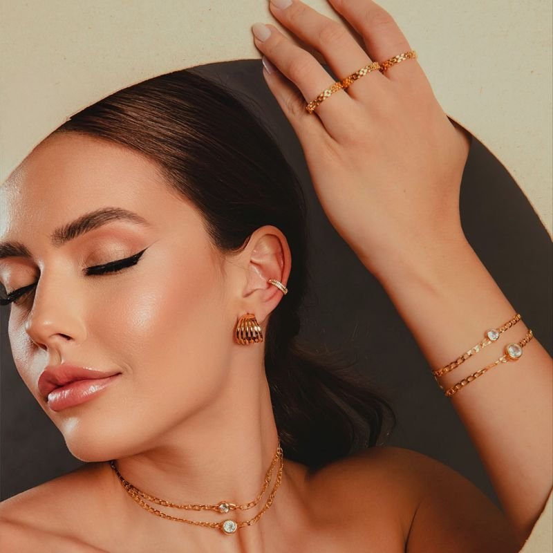 PULSEIRA ELOS ACHATADOS PONTO DE LUZ INTÉGRÉ 6MM DOURADO FOLHEADO