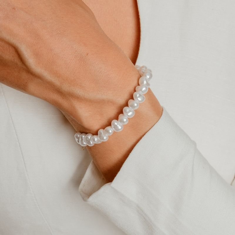 PULSEIRA MADRE PÉROLA ABSTRATA BANHADO A OURO 18K