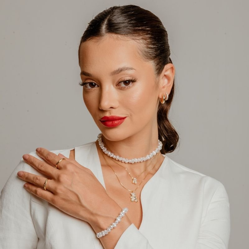 PULSEIRA MADRE PÉROLA ABSTRATA BANHADO A OURO 18K