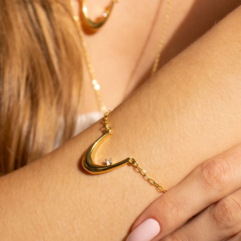 PULSEIRA MEIA LUA NA CATIER BANHADA A OURO 18K