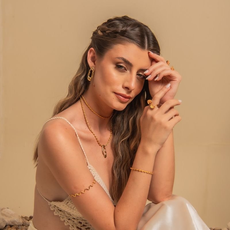 PULSEIRA ONDAS TRANÇADAS DOURADO FOLHEADO