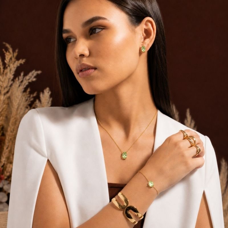 PULSEIRA PEDRA OVAL VERDE LIMA BANHADO A OURO 18K