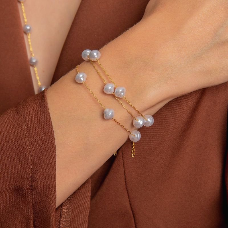 PULSEIRA PÉROLA BARROCA MEDIA DOURADO FOLHEADO