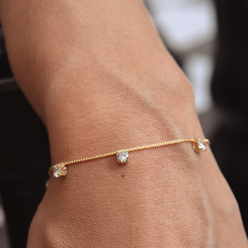 PULSEIRA PONTOS DE ZIRCÔNIAS BANHADO A OURO 18K